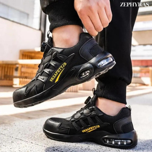 Schwarze Sicherheitsschuhe mit Stahlkappe, rutschfest, atmungsaktiv, für Arbeit und Outdoor.