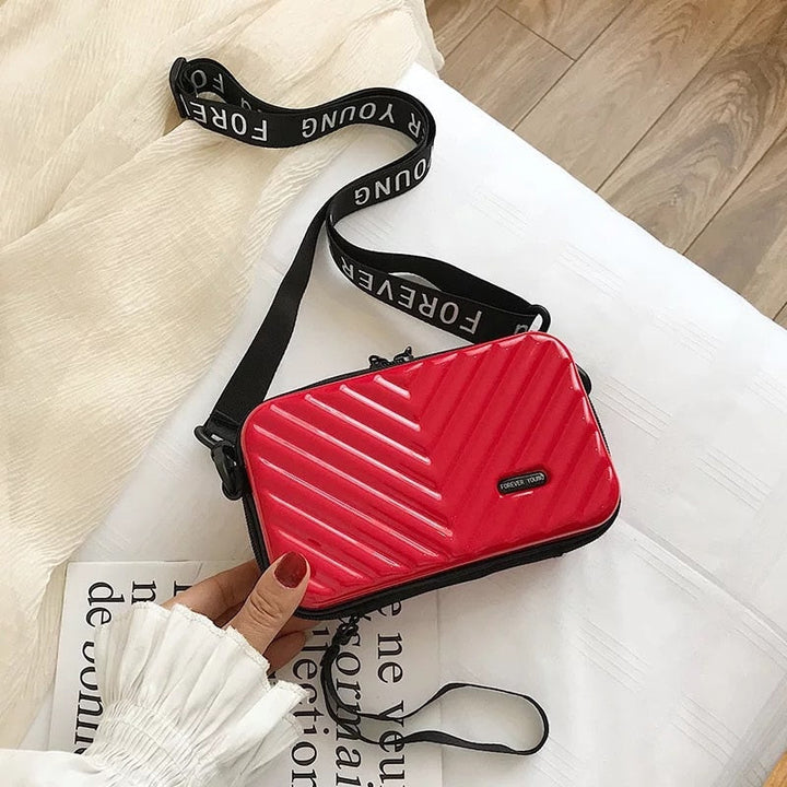 Kompakt kemény héjú utazótáska