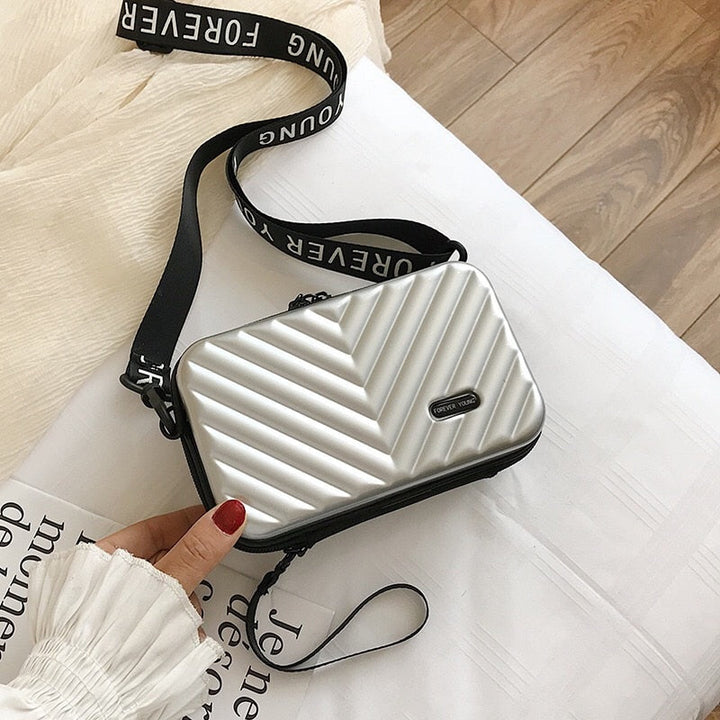 Kompakt kemény héjú utazótáska